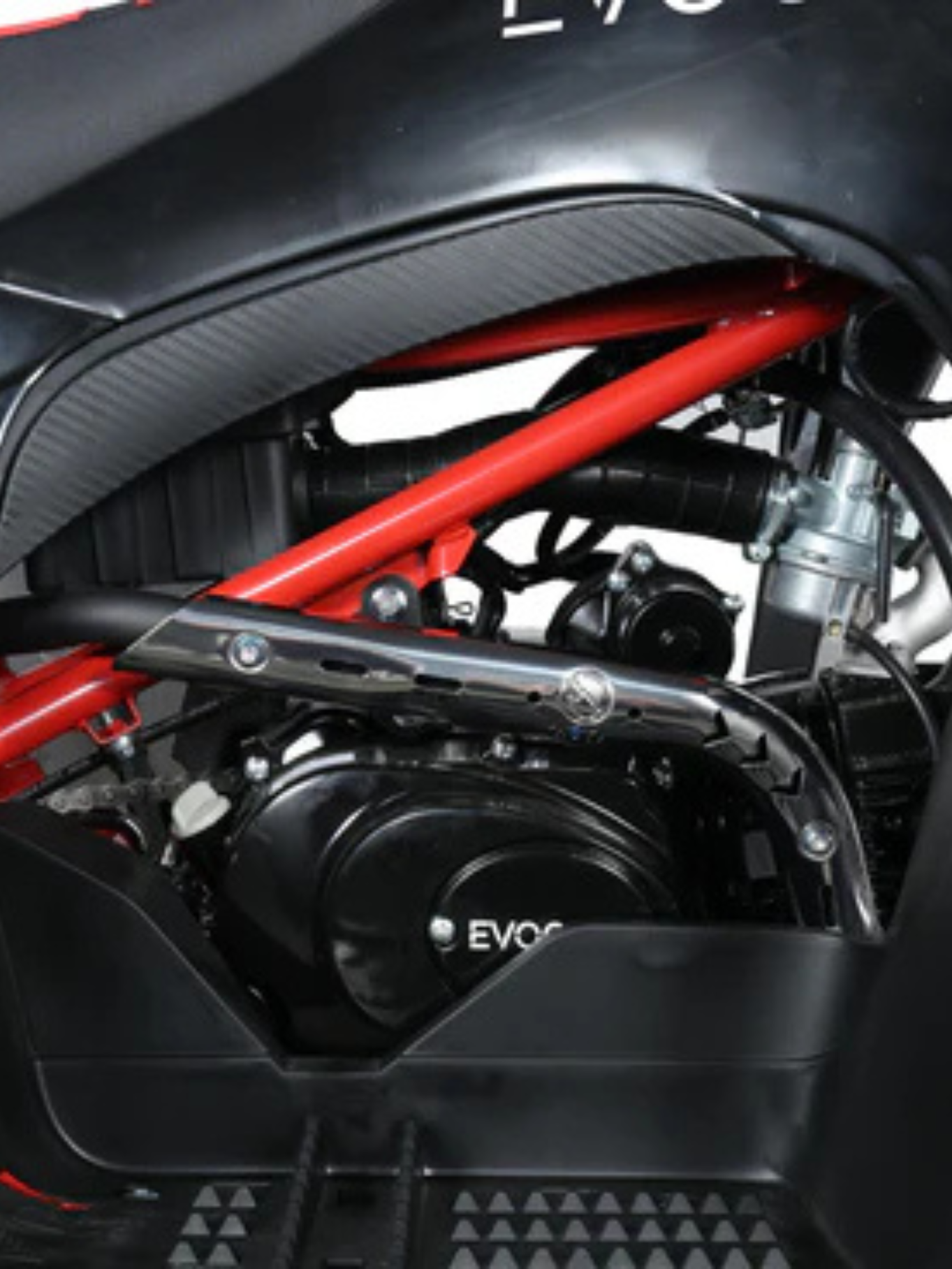 Rear view 125XR ATV with tail light,
Evoque 125XR with knobby off-road tires,
125XR quad bike with alloy wheels,
125cc air-cooled engine Evoque ATV